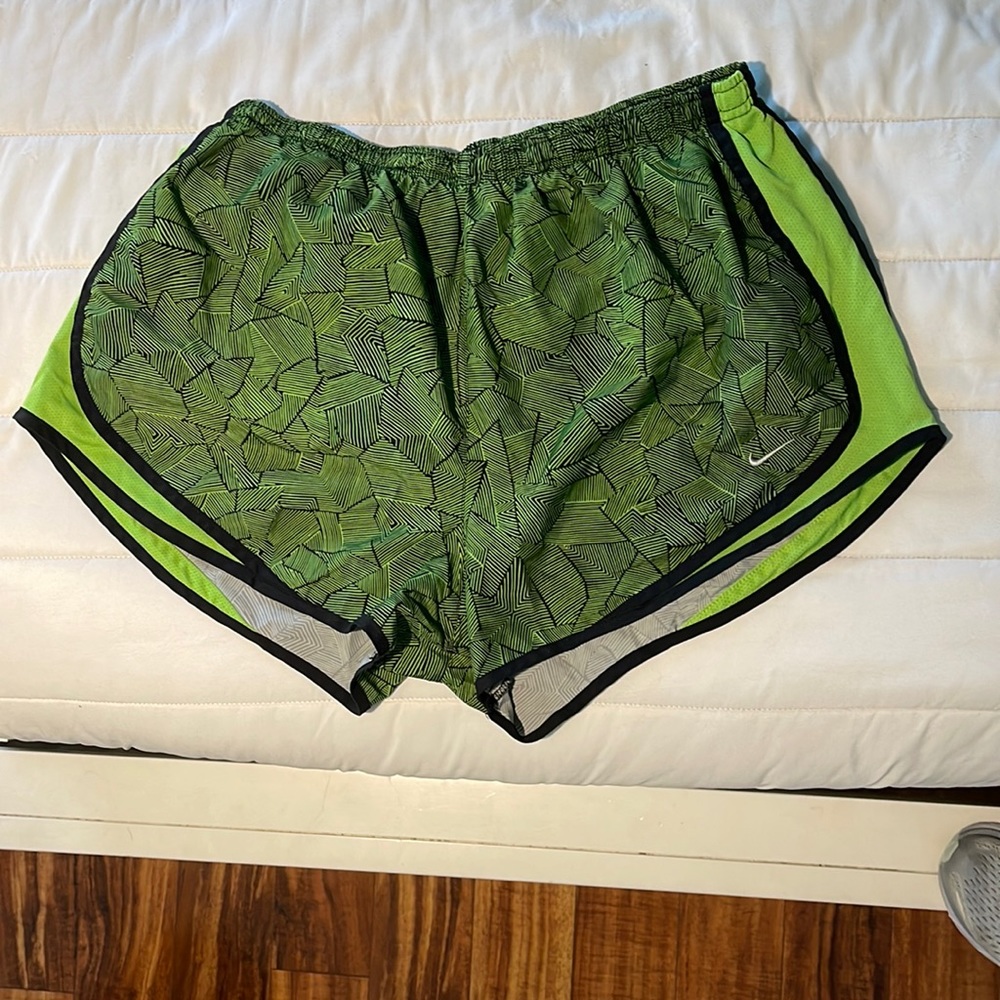 Green Nike running shorts